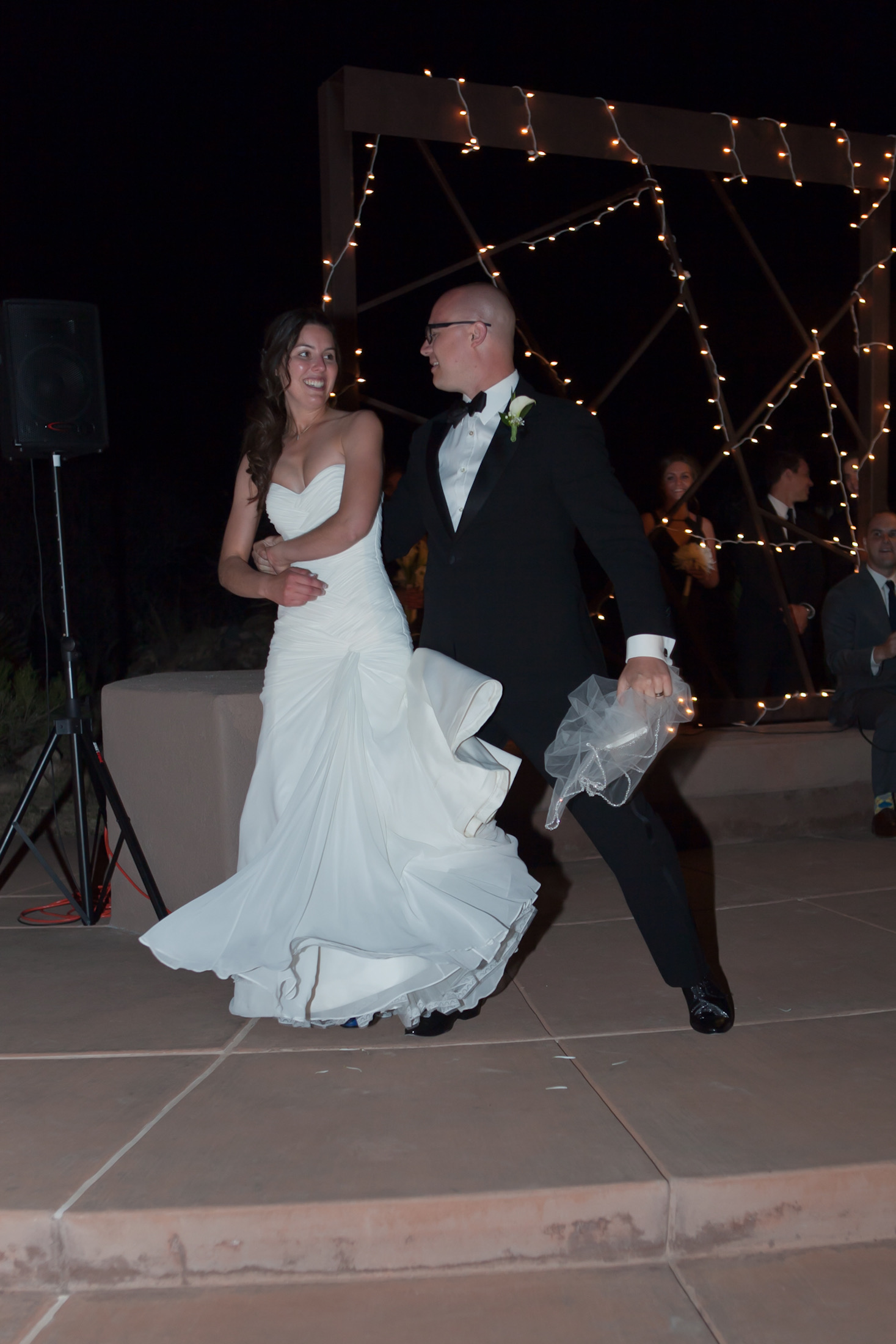 First dance — groom holding bride's veil